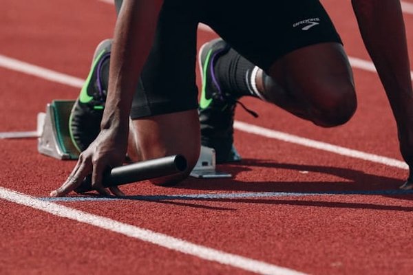 How Can Acoustic Feedback Devices Improve Start Reaction Times in Track Sprinters?